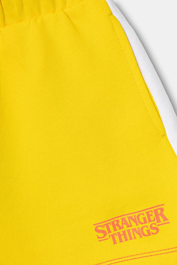 Трикотажні шорти дитячі бавовняні United Colors of Benetton колір жовтий фото 2