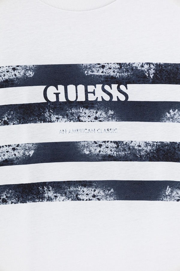 Детская хлопковая футболка Guess цвет белый фото 2