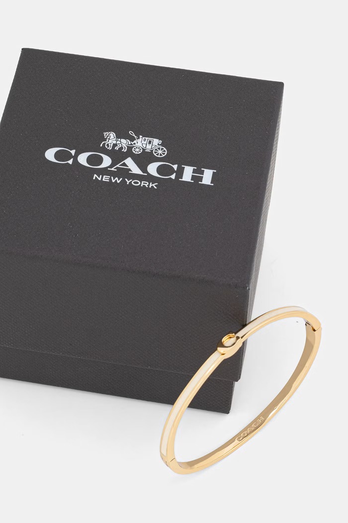 Akcesoria Coach bransoletka damska metalowa 37553124GLD100 beżowy
