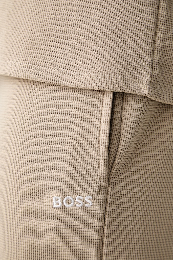 BOSS teplákové nohavice pánske s bavlnou Waffle Pants béžová 50535877