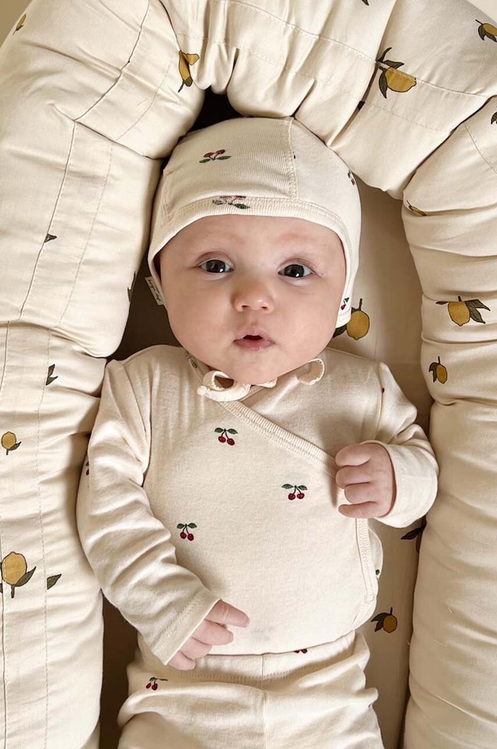 Pamučna kapa za bebe Konges Sløjd BABY HELMET GOTS Planet friendly bež KS3551