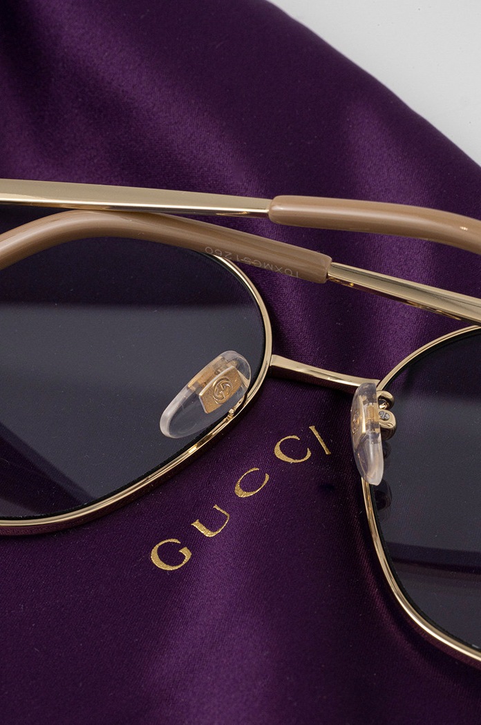 Okulary przeciwsłoneczne Gucci złoty GG1089SA