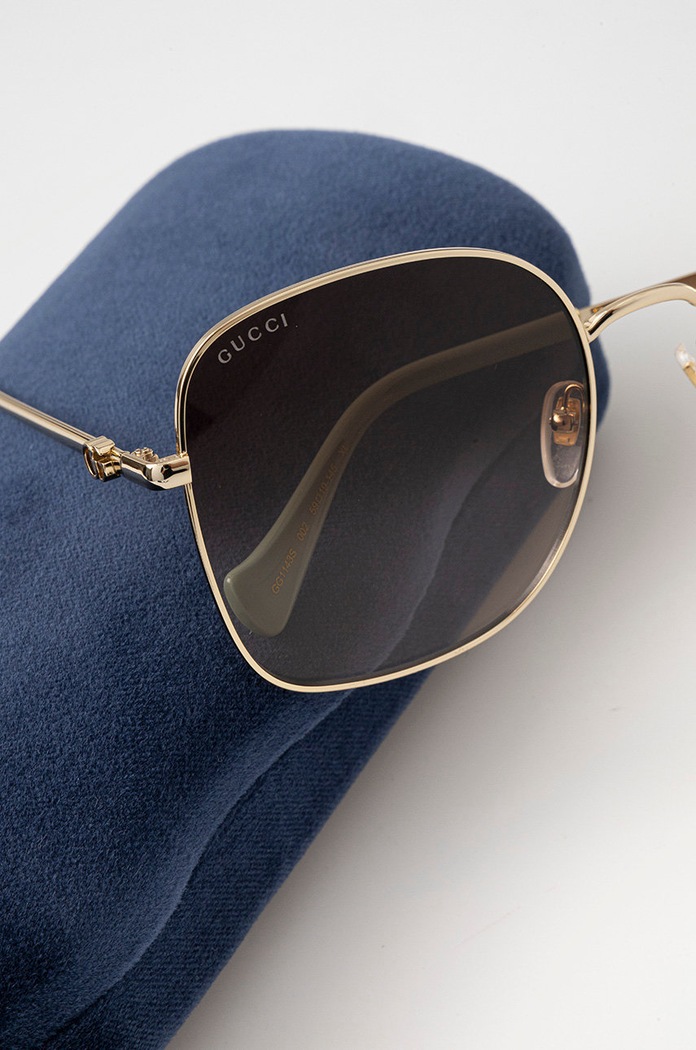 Okulary przeciwsłoneczne Gucci GG1143S złoty