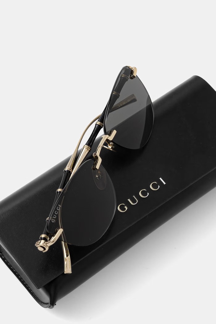 Akcesoria Gucci okulary przeciwsłoneczne damskie GG2063S złoty