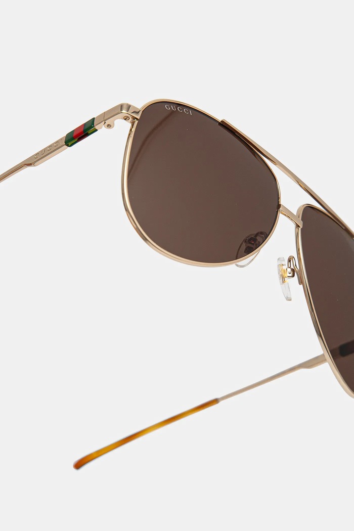Slnečné okuliare Gucci zlatá GG1677S