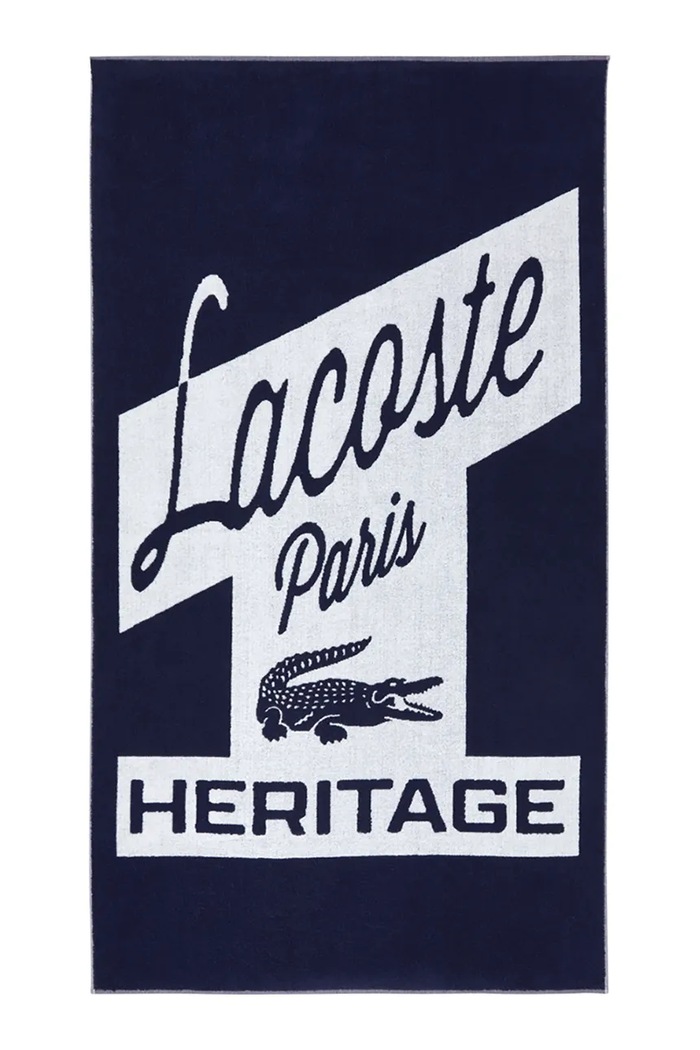 Bavlnený plážový uterák Lacoste LRETRO Marine 90 x 160 cm tmavomodrá 1062062