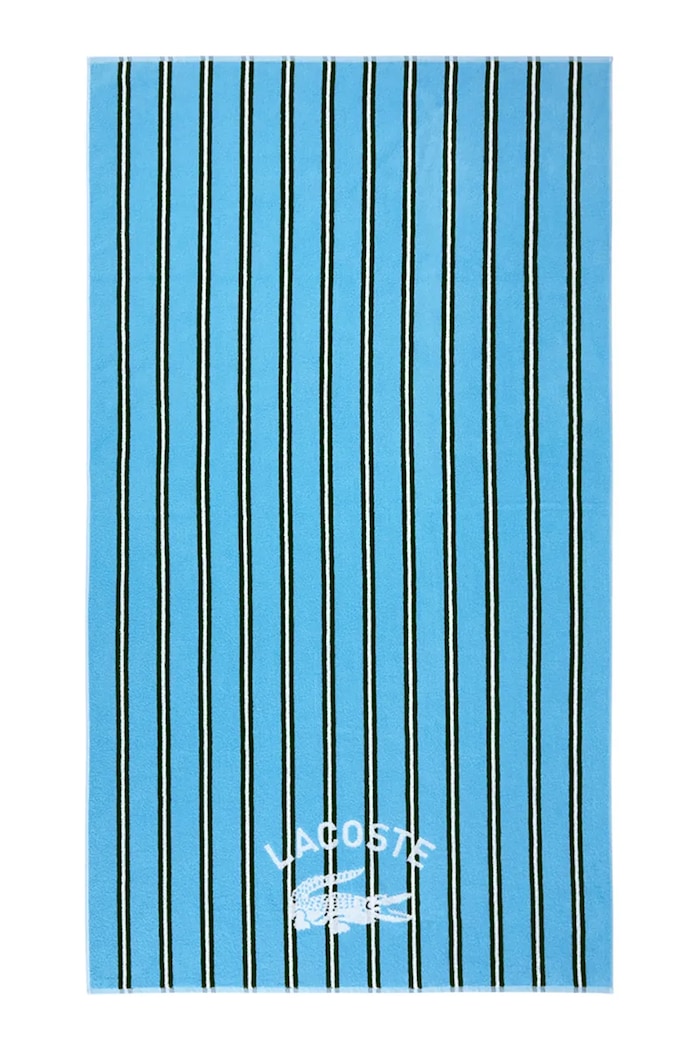 Bavlnený plážový uterák Lacoste LSUNSTRI Baltic 90 x 160 cm modrá 1067101
