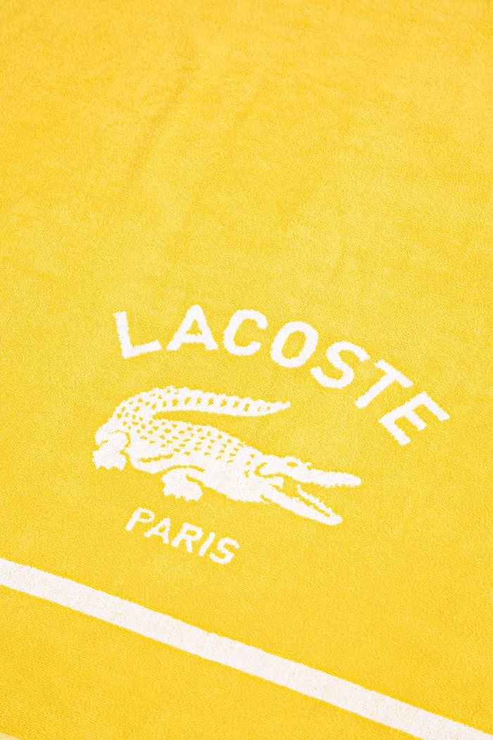 Doplnky Bavlnený plážový uterák Lacoste LORIGINE Jaune 90 x 160 cm 1047044 žltá