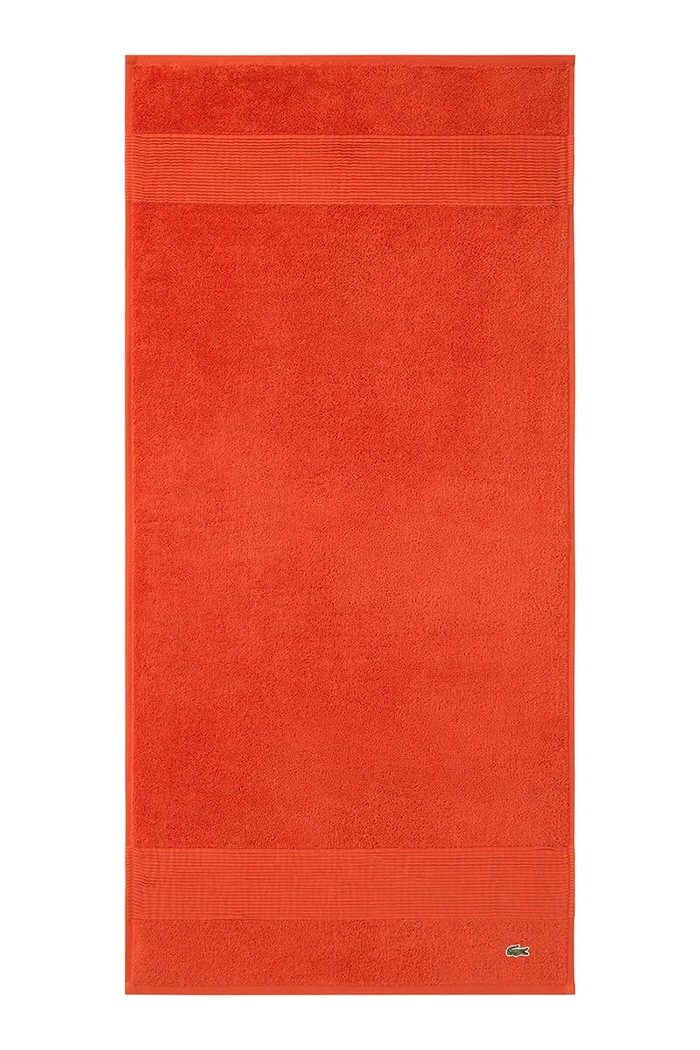 Středně velký bavlněný ručník Lacoste L LECROCO Glaieul 50 x 100 cm oranžová 972207