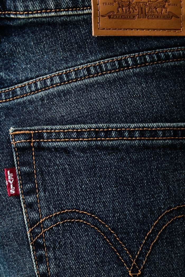 Jeansy flare damskie RIBCAGE FLARE H226 Levi's 0083R granatowy