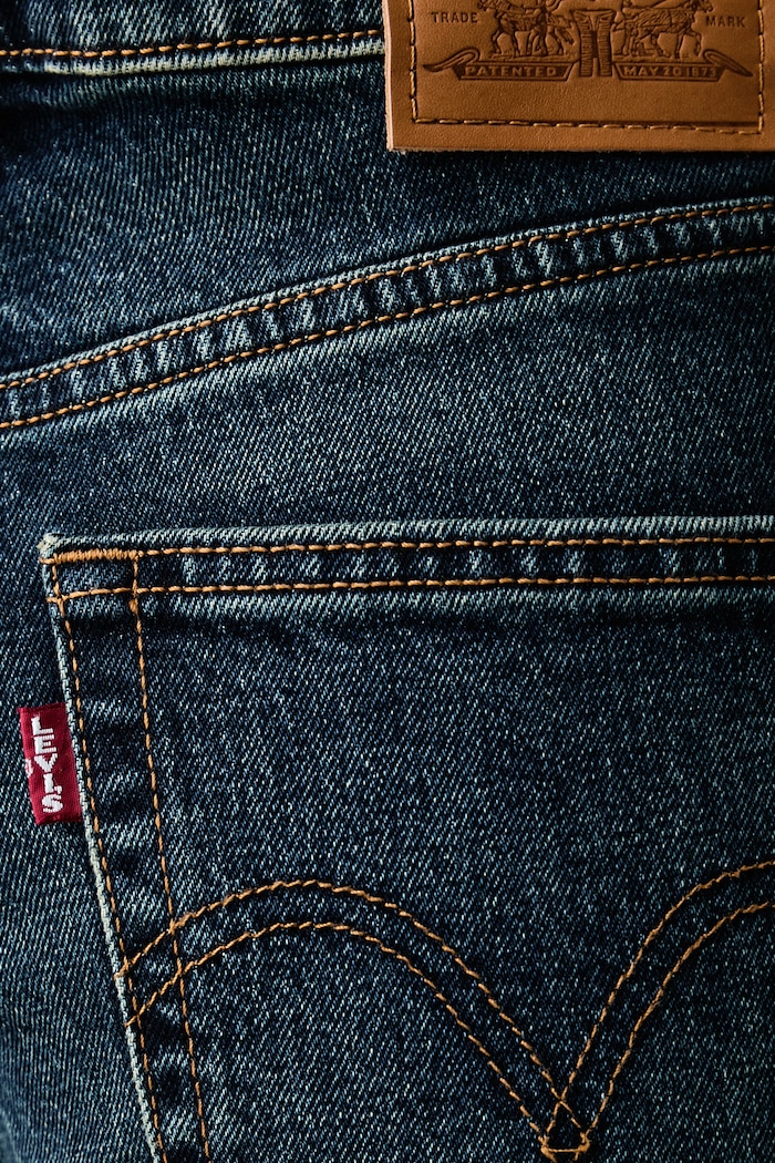 Jeansy flare damskie RIBCAGE FLARE H226 Levi's 0083R granatowy