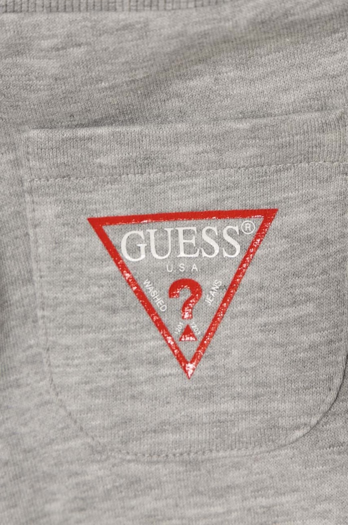 Dječaci Dječji pamučni donji dio trenirke Guess N93Q17.KAUG0.9BYH siva