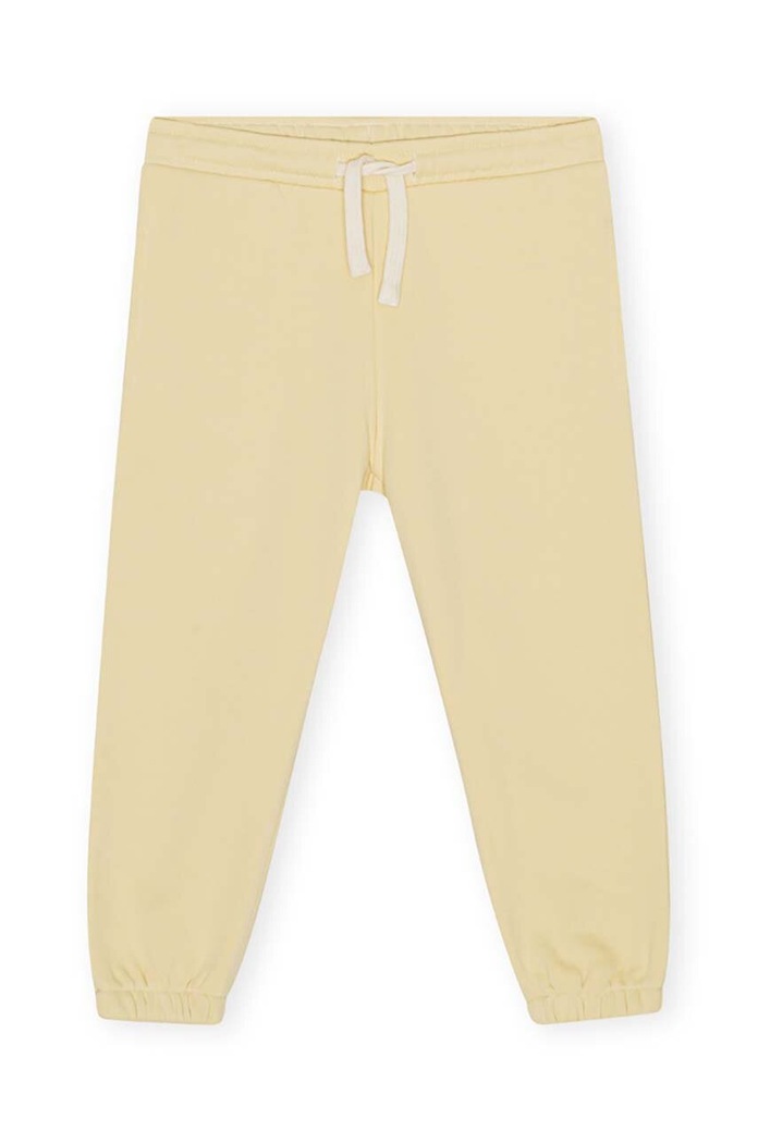 Dětské tepláky Konges Sløjd LOU SWEAT PANTS pletenina žlutá KS5675