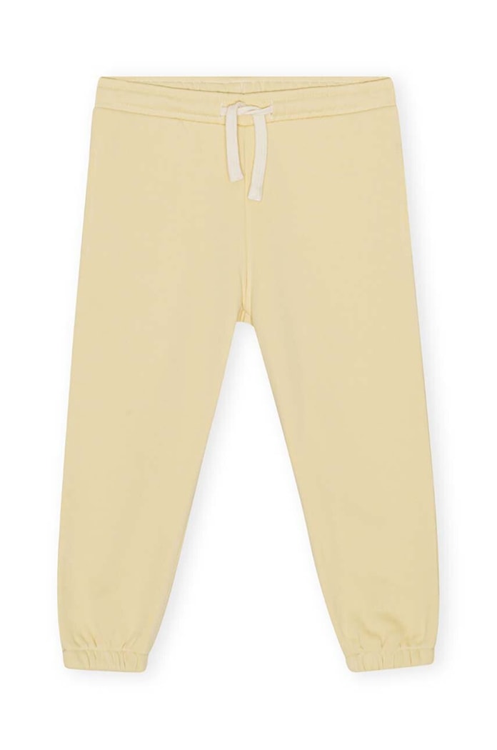 Dětské tepláky Konges Sløjd LOU SWEAT PANTS pletenina žlutá KS5675