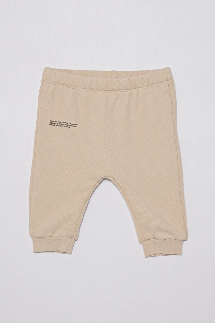 Pangaia spodnie BABY 365 MIDWEIGHT TRACK PANTS bawełna beżowy 10000656.CORE