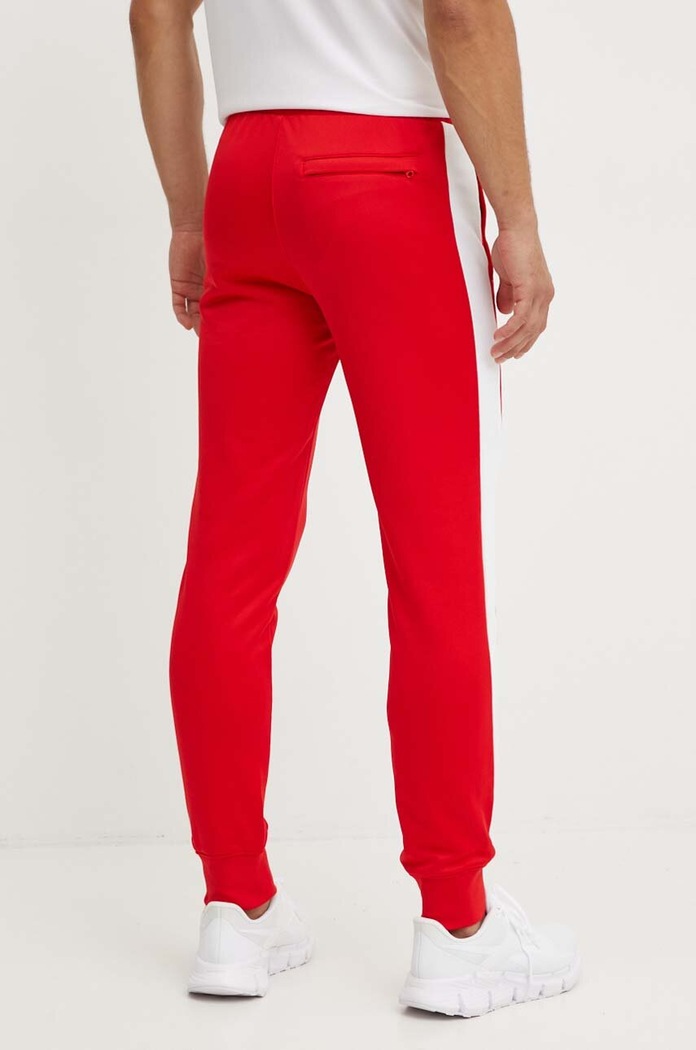 Tepláky Puma červená 530098.11