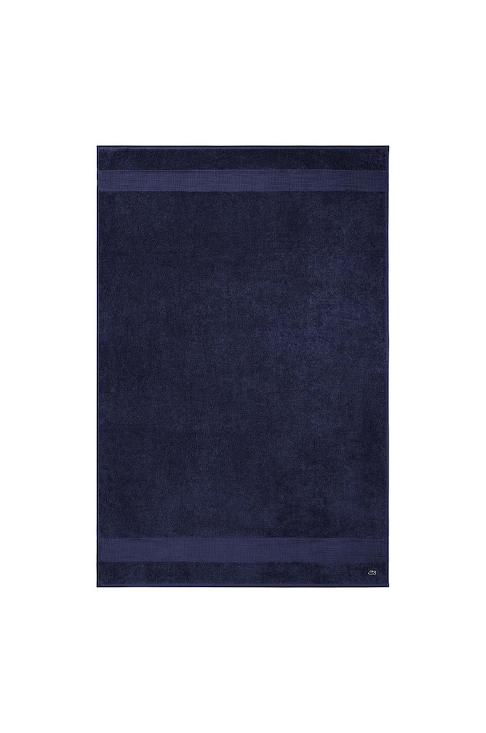 Stredný bavlnený uterák Lacoste Marine 100 x 150 cm modrá 972173