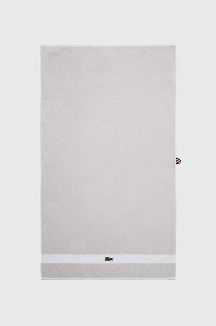 Středně velký bavlněný ručník Lacoste L Casual Argent 70 x 140 cm bílá 971933