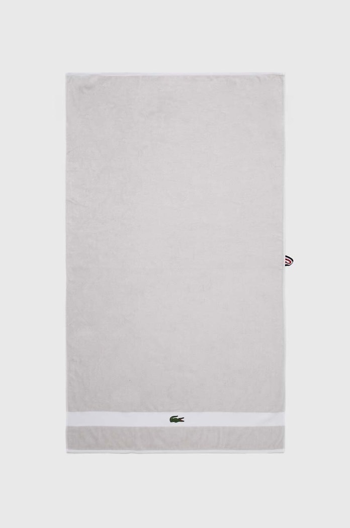 Středně velký bavlněný ručník Lacoste L Casual Argent 70 x 140 cm bílá 971933