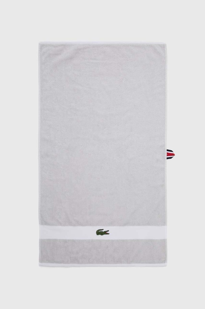 Malý bavlněný ručník Lacoste L Casual Argent 55 x 100 cm šedá 1010868.