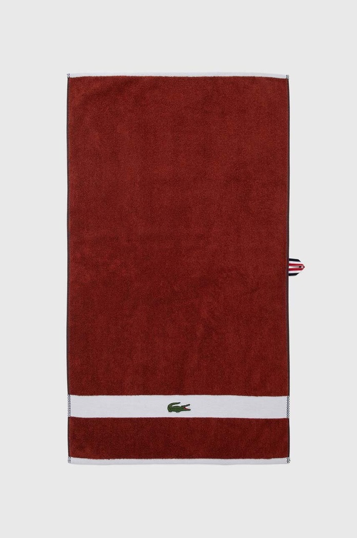 Malý bavlněný ručník Lacoste L Casual Terre Battue 55 x 100 cm hnědá 1010876.