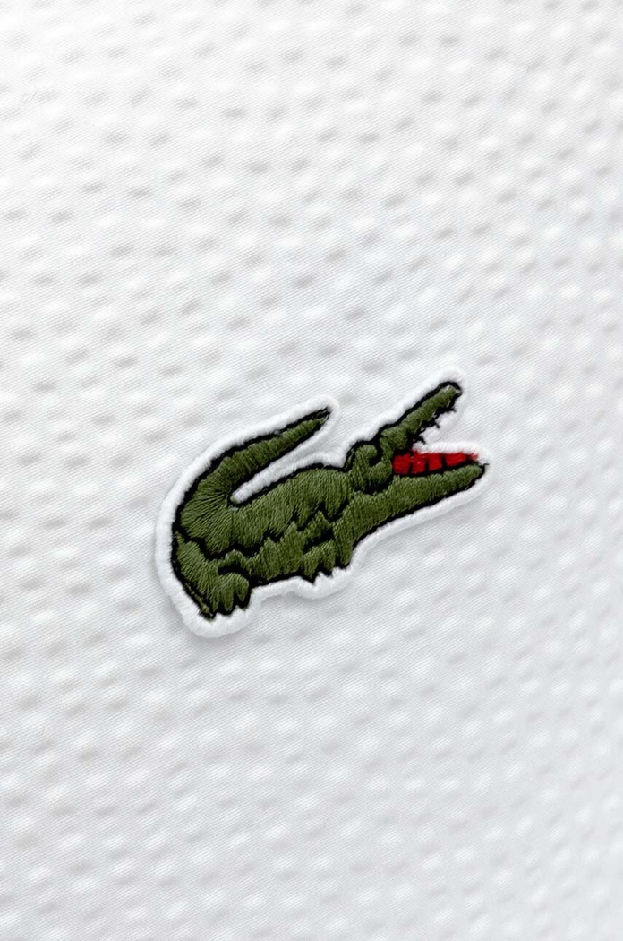 Față de pernă din bumbac L Tamis Blanc 65 x 65 cm Lacoste 1038679 alb