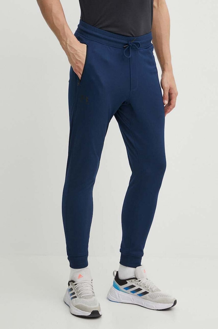 Nohavice Under Armour 1290261. tmavomodrá 1290261.