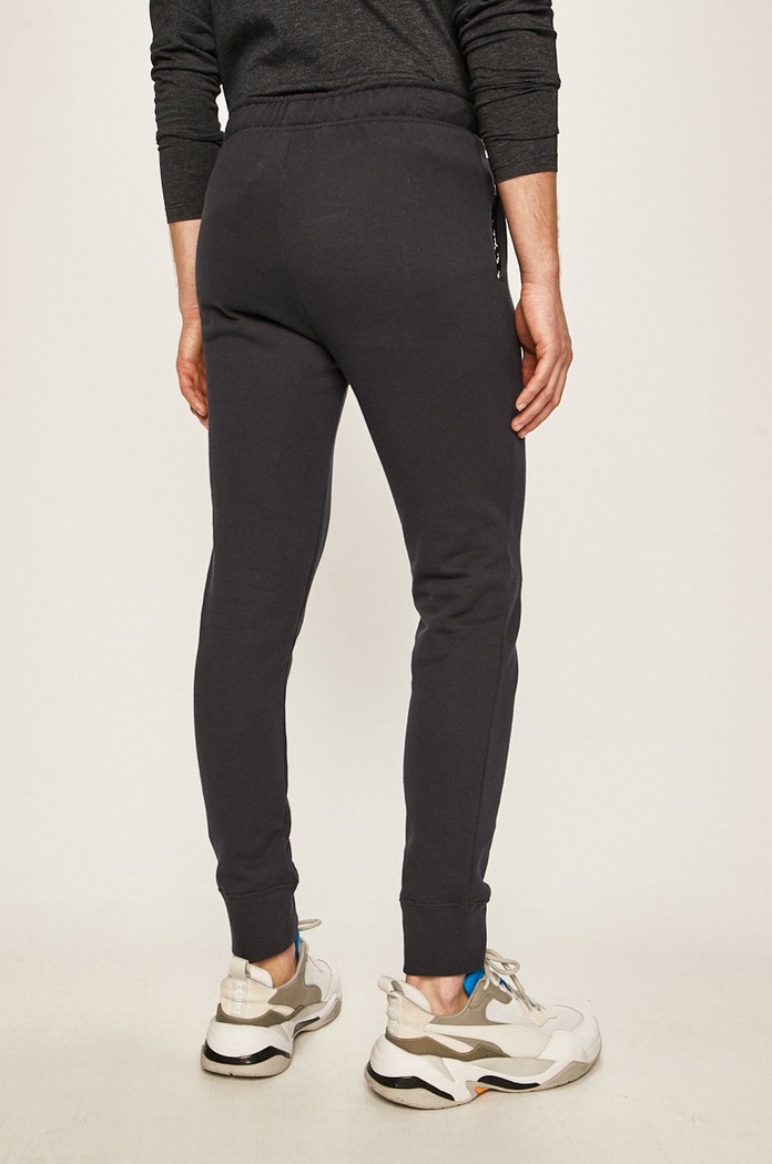Îmbrăcăminte Champion - Pantaloni 213529 213529 bleumarin