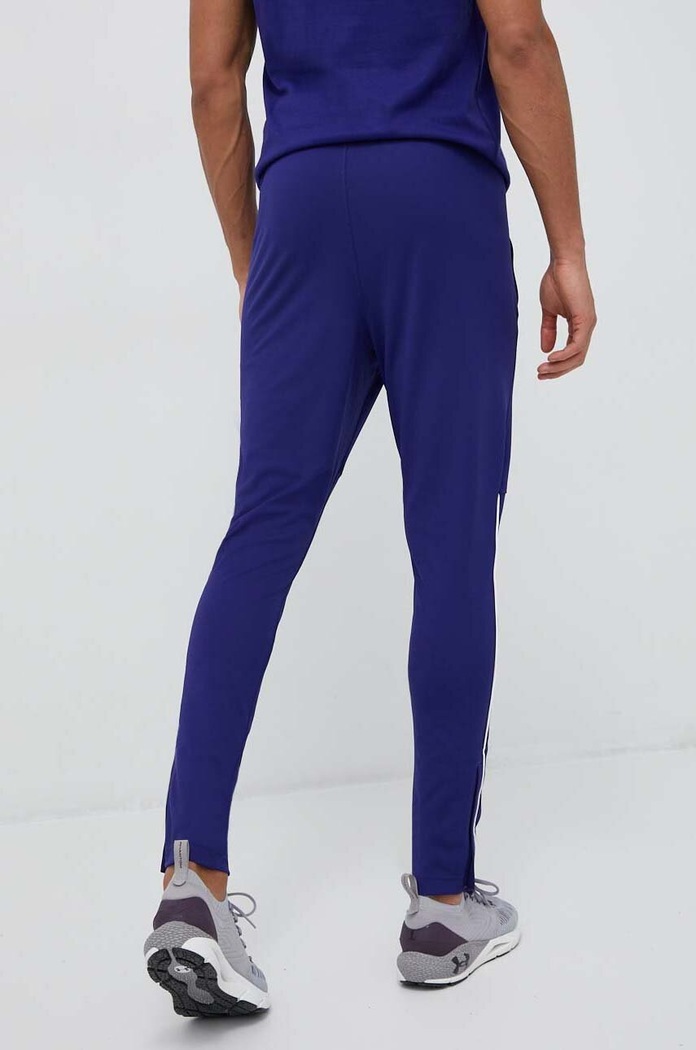 Odzież Under Armour spodnie dresowe Pique 1366203 fioletowy