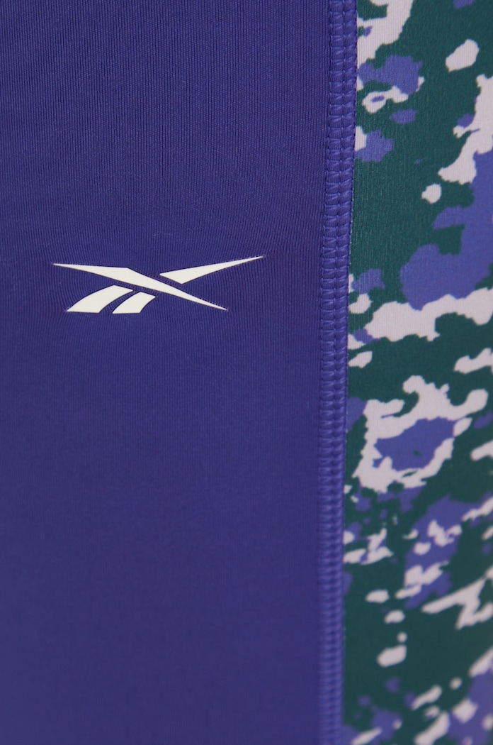 Тренировочные леггинсы Reebok Modern Safari фиолетовой HH8056