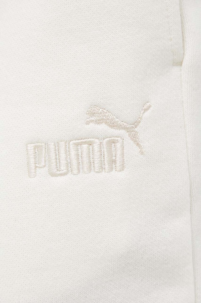 Spodnie Puma 670007. beżowy