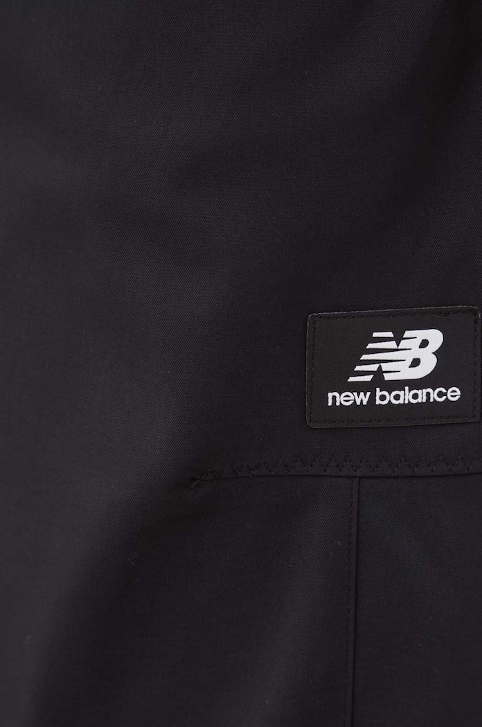 Tepláky New Balance černá WP23506BK