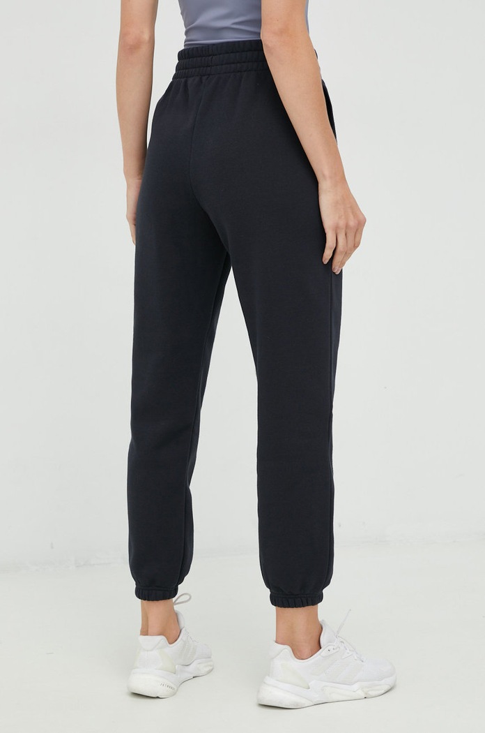 Ρούχα Παντελόνι φόρμας Under Armour 1373034 μαύρο