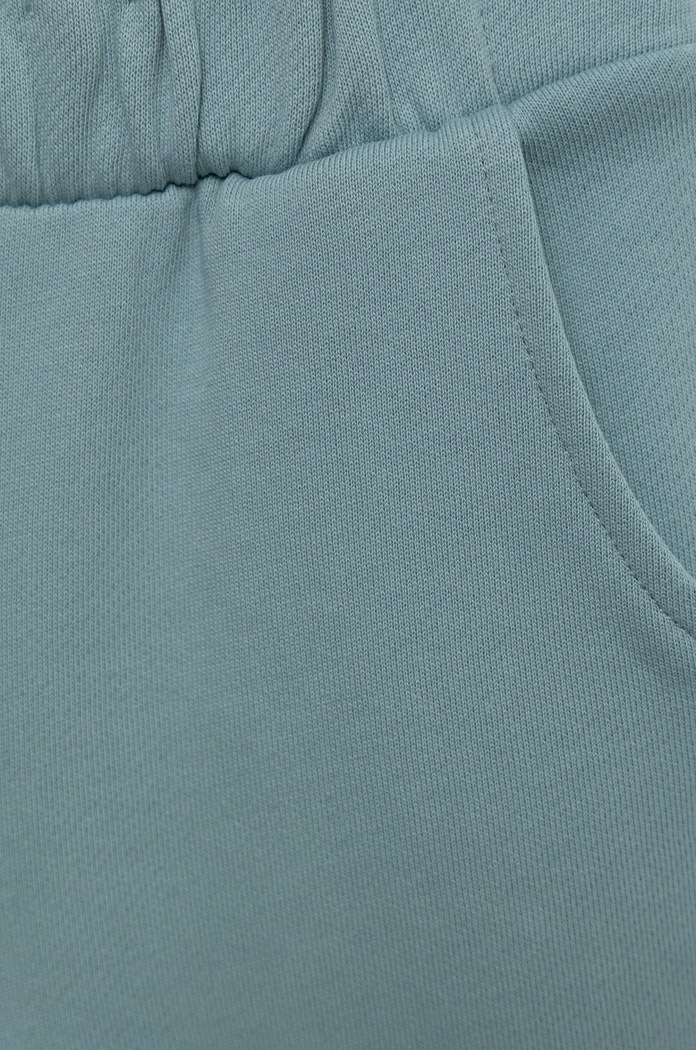 Dziewczynka United Colors of Benetton spodnie dresowe bawełniane dziecięce 3QLAGF015.P niebieski