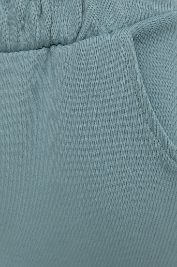 Dziewczynka United Colors of Benetton spodnie dresowe bawełniane dziecięce 3QLAGF015.P niebieski
