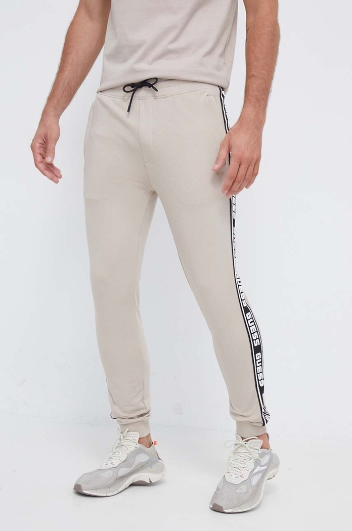 Guess spodnie dresowe NEW ARLO z elastanem beżowy Z2YB19.K6ZS1