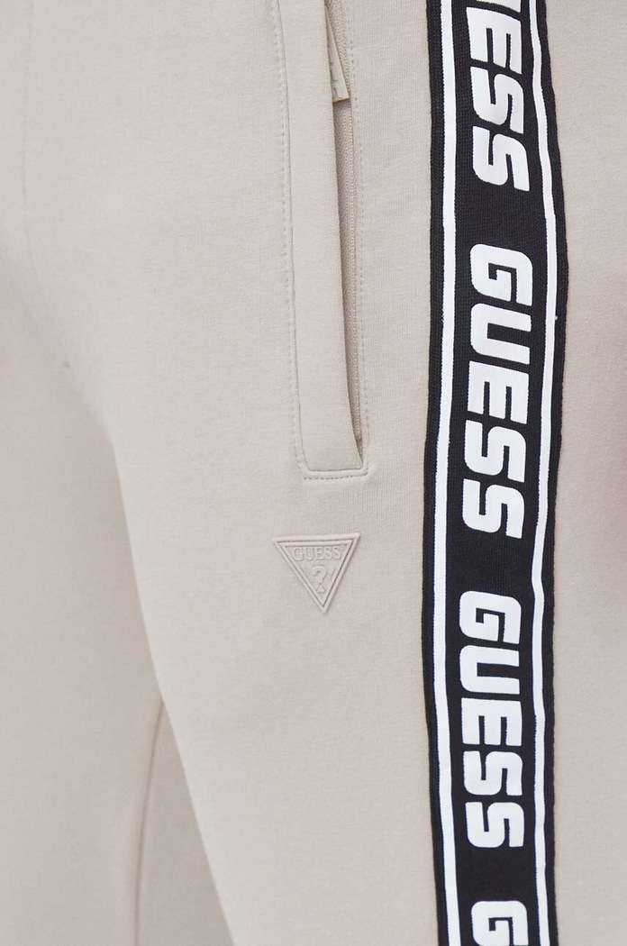 Guess spodnie dresowe NEW ARLO beżowy Z2YB19.K6ZS1