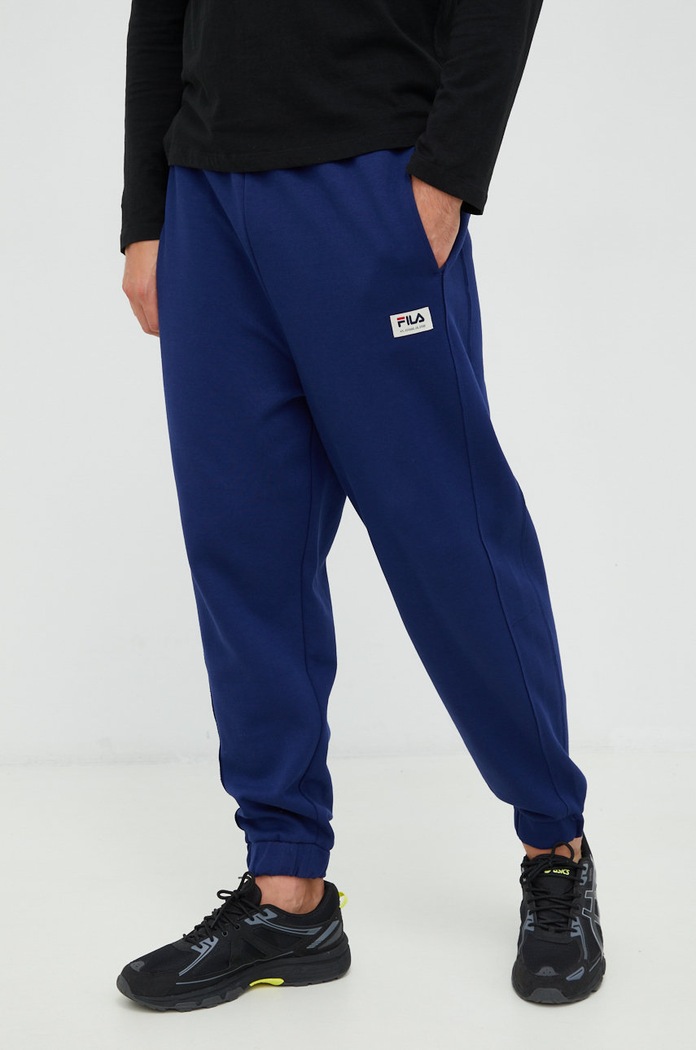 Tepláky Fila FAM0153 tmavomodrá AW22