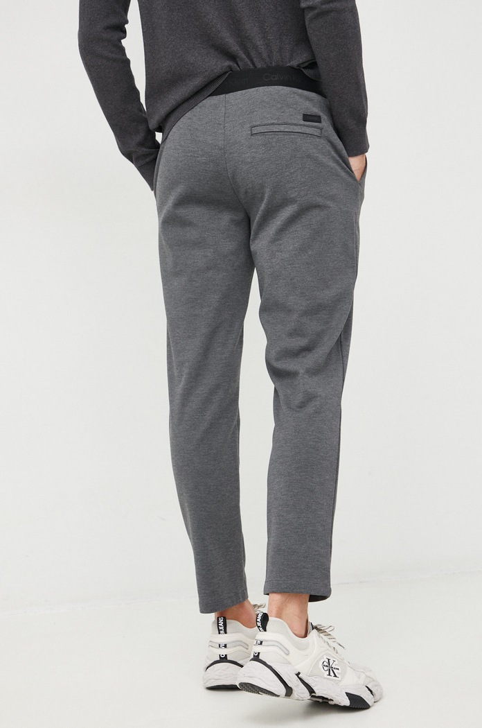 Odzież Calvin Klein spodnie K10K109913.9BYY szary