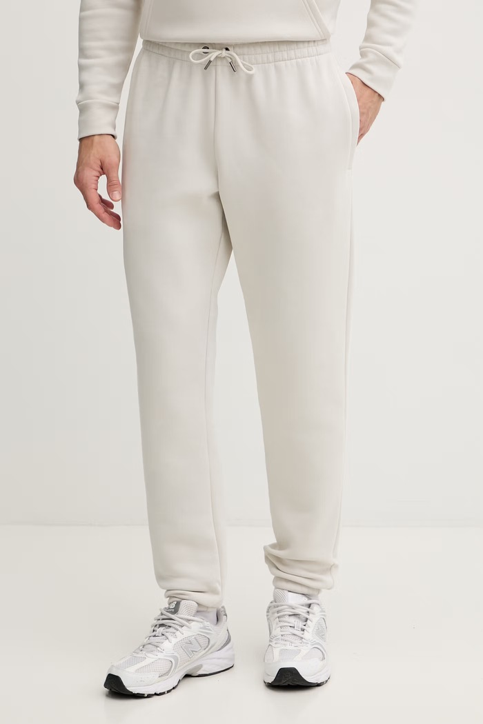 Under Armour trenirka moška z bombažem Essential Fleece bež 1373882