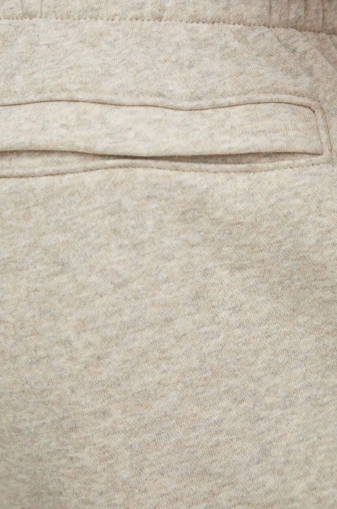 Under Armour teplákové nohavice pánske s bavlnou Essential Fleece béžová 1373882