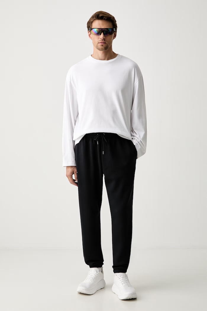 Under Armour melegítő férfi pamuttal Essential Fleece 1373882 fekete SS26