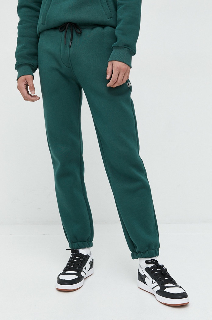 Tepláky Kangol KAF22USPA105 tyrkysová AW22