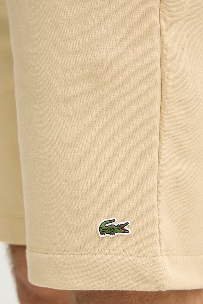 Lacoste teplákové šortky pánské s bavlnou béžová GH9627