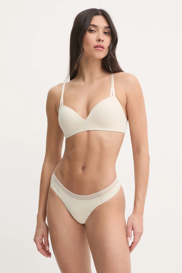 Calvin Klein Underwear stringi damskie 000QF6307E beżowy SS26