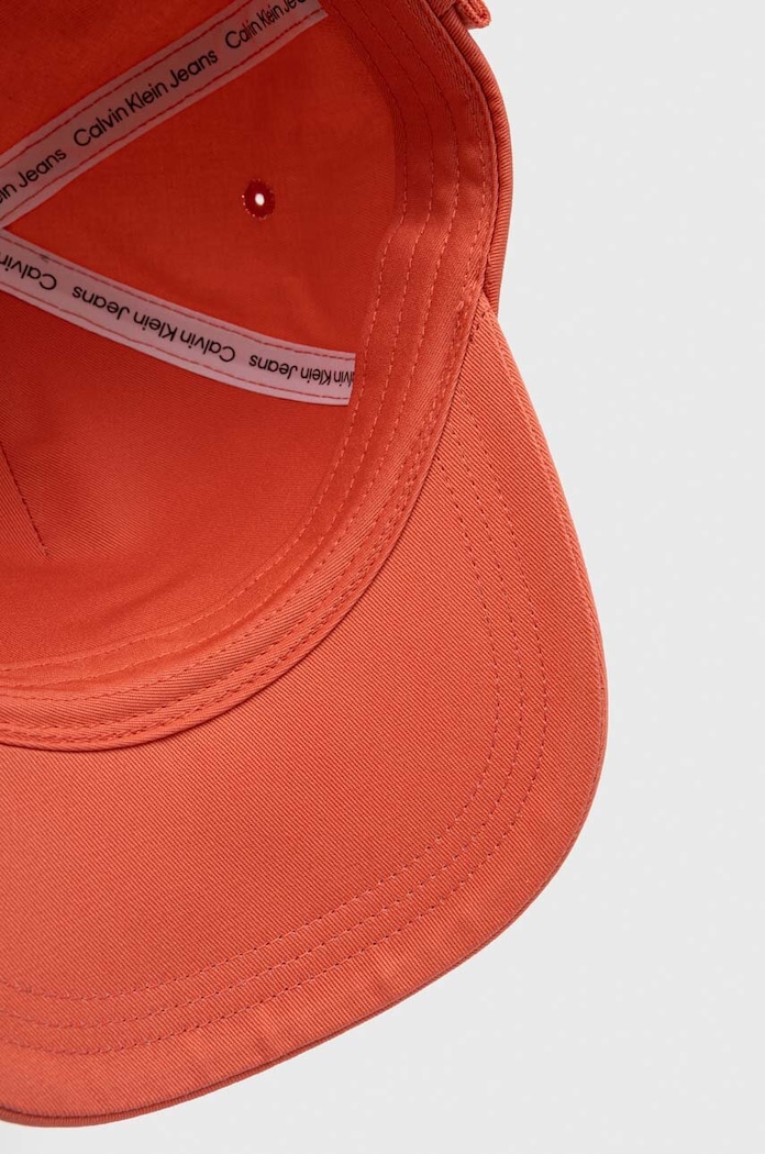 Bavlnená šiltovka Calvin Klein Jeans oranžová K60K610910