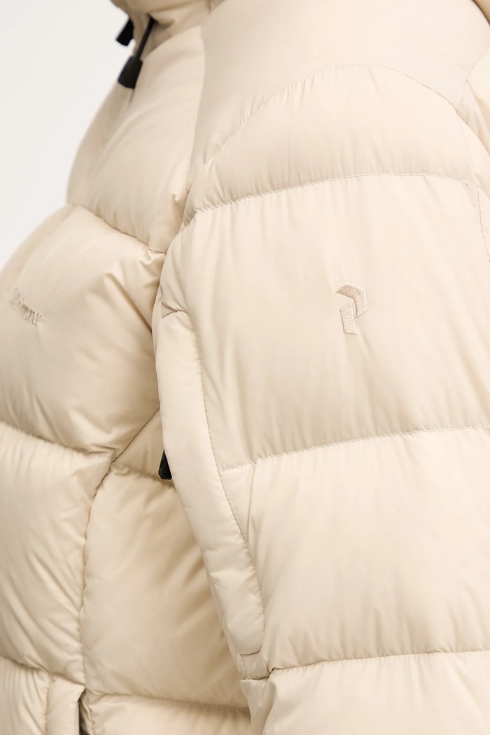 Péřová sportovní bunda Peak Performance Frost G79632 béžová