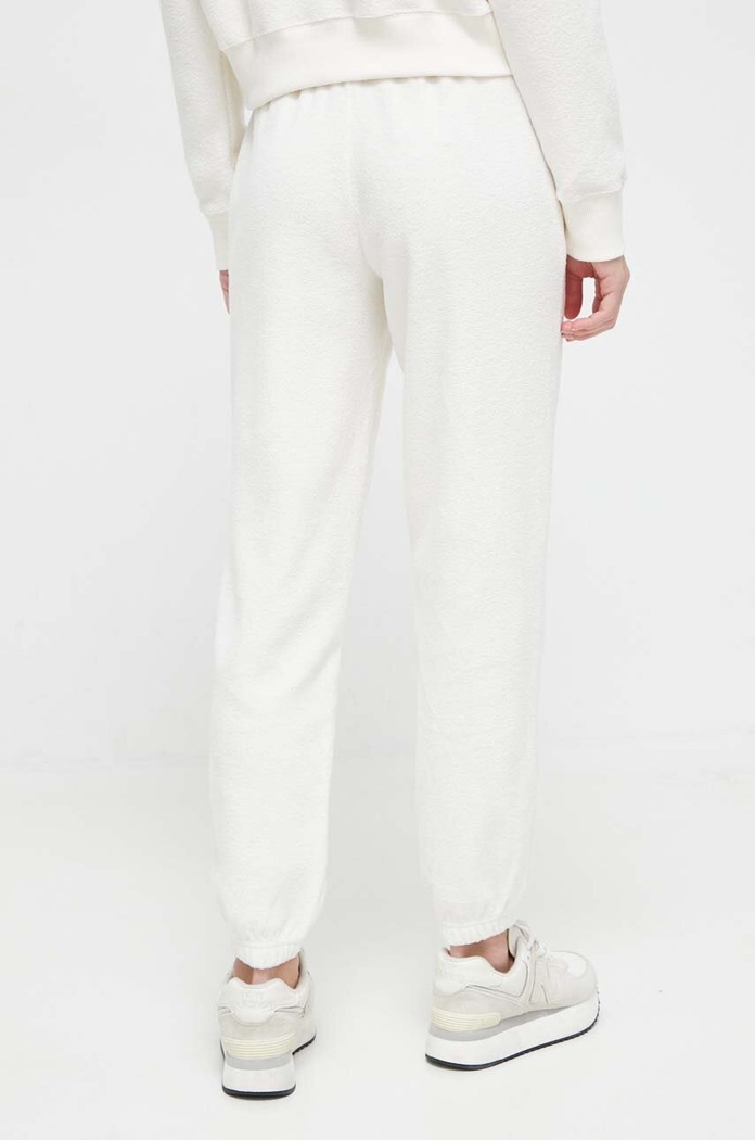Îmbrăcăminte Puma pantaloni de trening 621414 bej