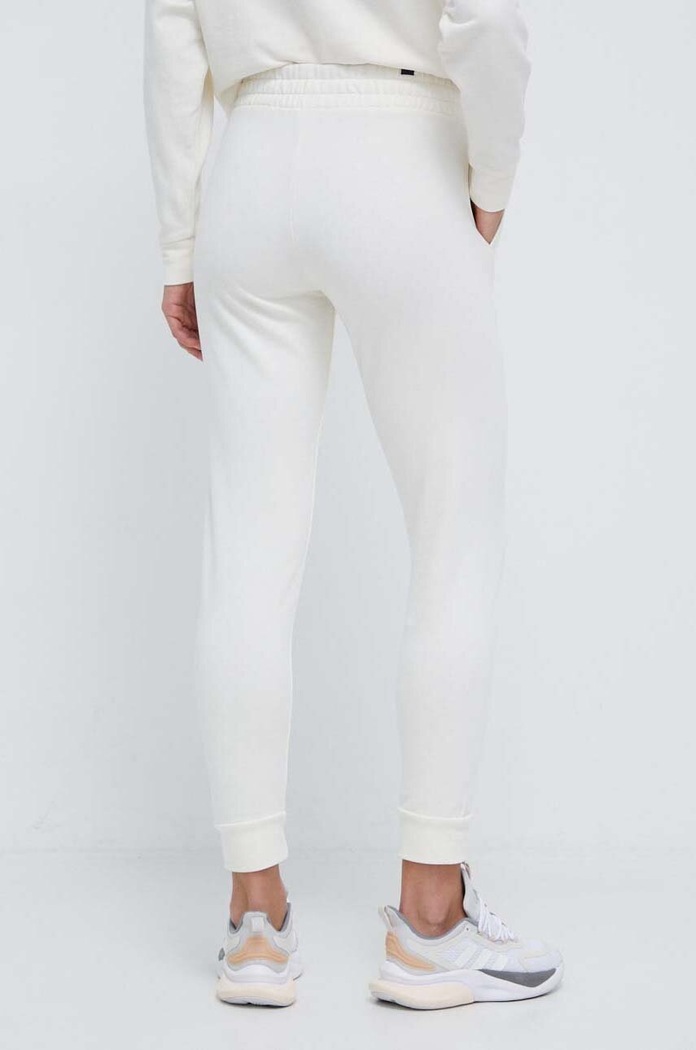 Odzież Puma spodnie dresowe bawełniane BETTER ESSENTIALS 675989 beżowy