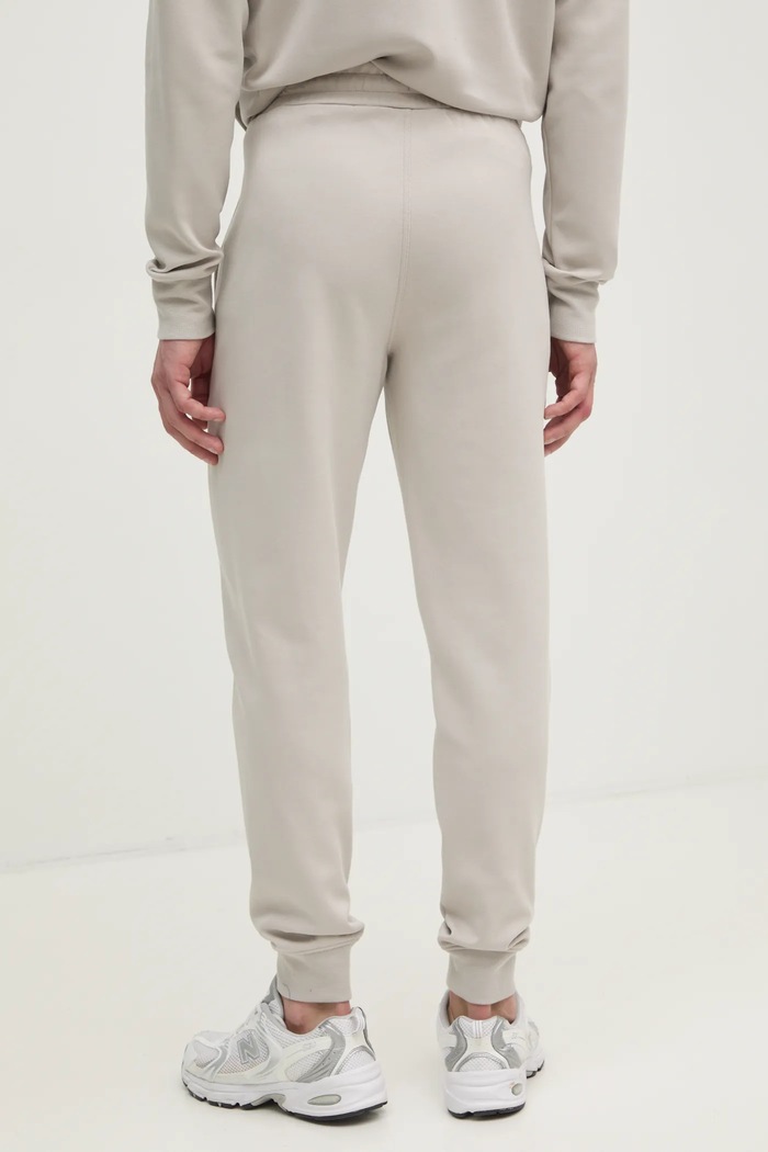 Odzież Calvin Klein spodnie dresowe K10K109940 beżowy